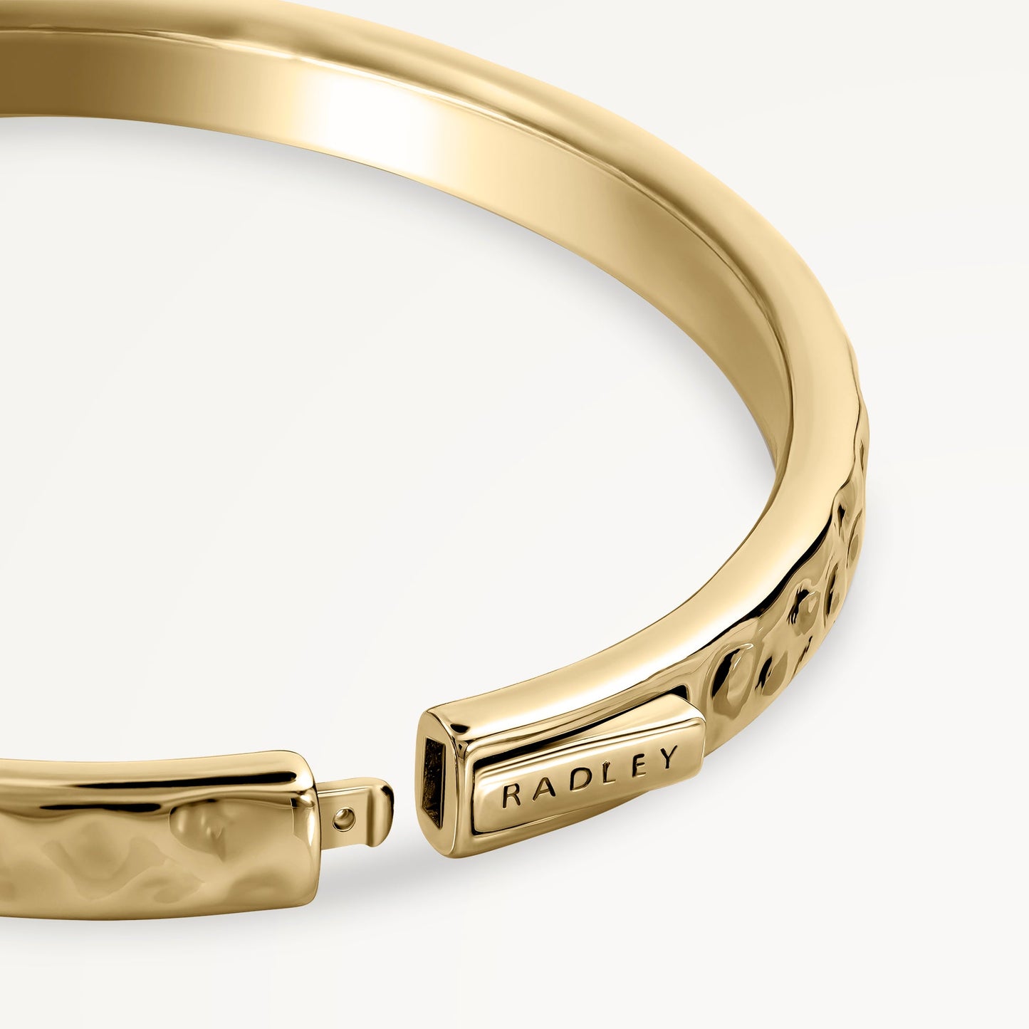 Radley London Gold Hammer Effect Bangle